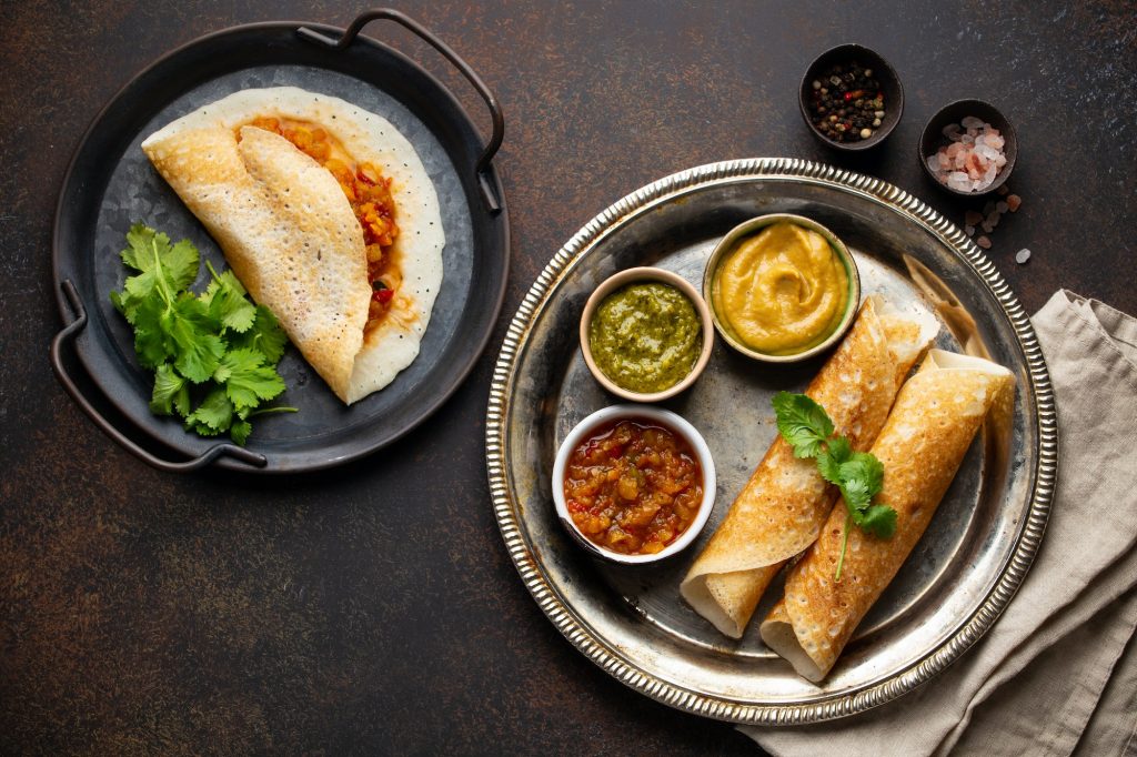 Different types of traditional Indian rice pancakes Dosa